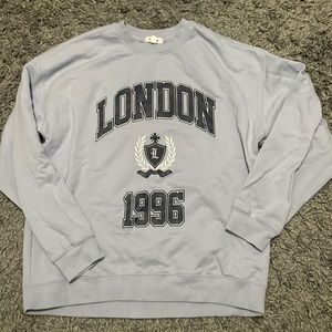 Garage- London 1996 light blue crewneck sweatshirt with navy blue writing